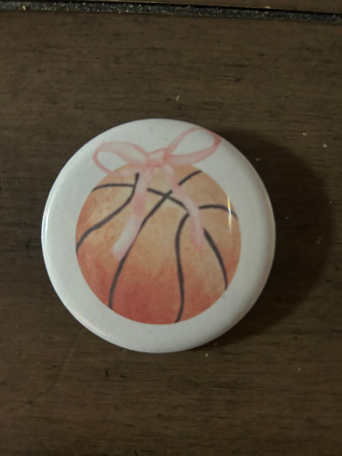 basketball bow button