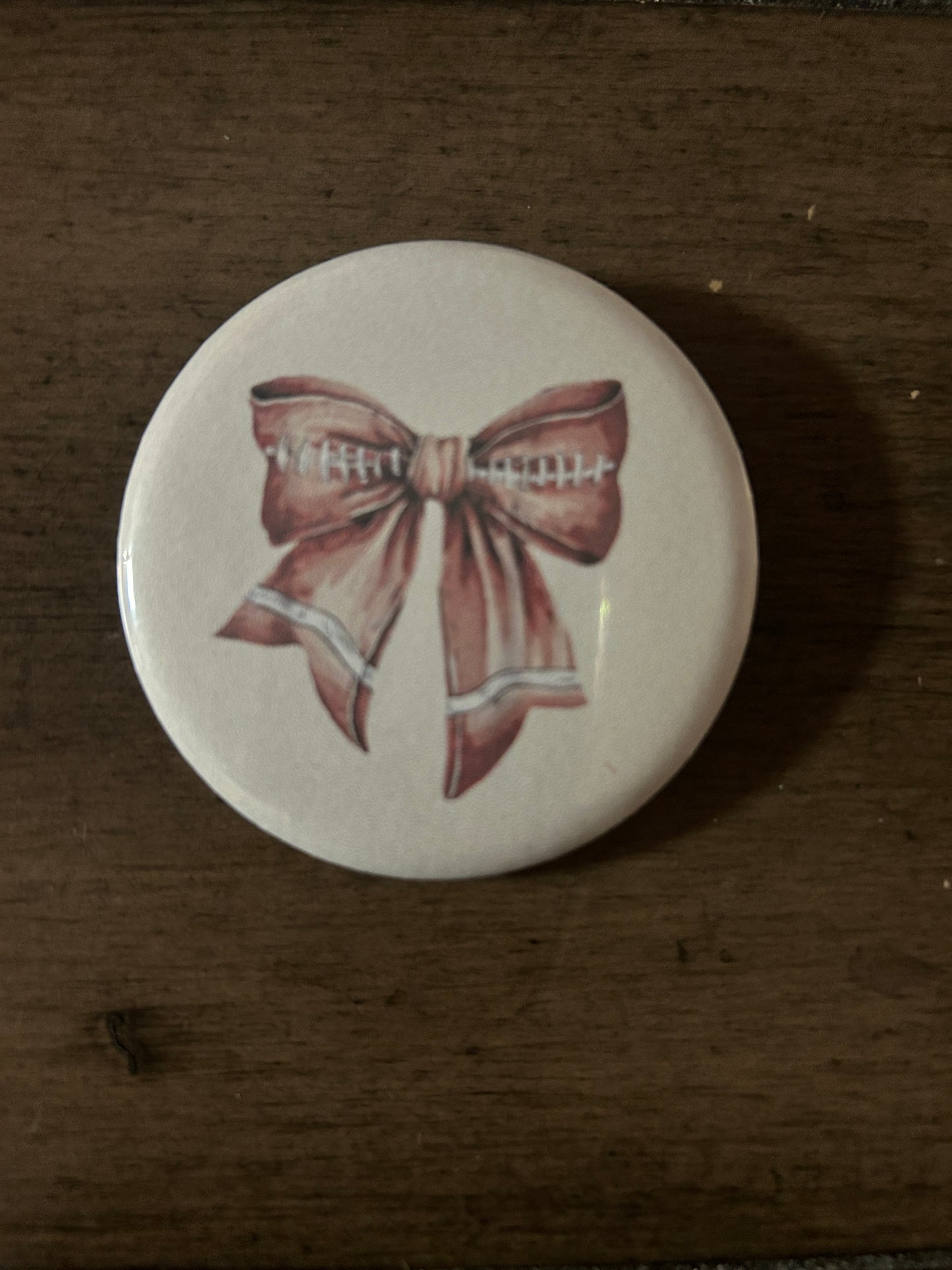 football bow button